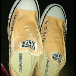 New never worn pair of unisex orange Converse